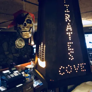 a pirate skull hanging from the ceiling