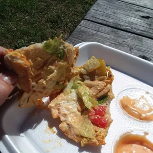 I'm less than halfway through this hamburger, but the meat is already gone because it was so small. I'm left with 2/3 bun and condiments.