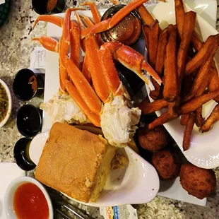 3cluster crableg special,  corn bread and sweet potatoe fries with hushpuppies.