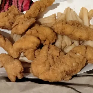 a plate of fried fish and fries