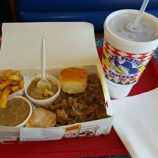 a tray of food and a drink