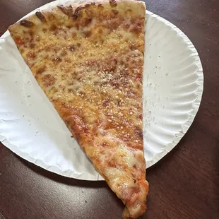Slice of cheese pizza I will say today I was not impressed like every other time. I just get cheese pizza. I'm so happy I found this spot.