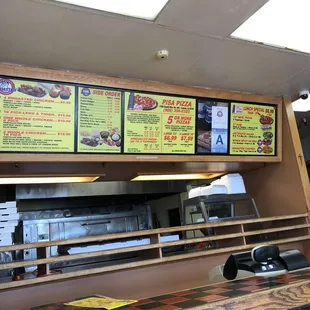 menus on the wall of the restaurant