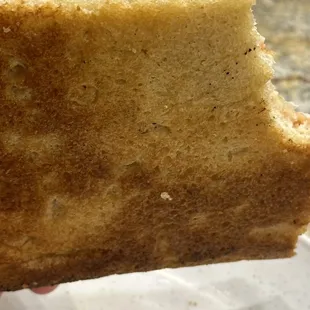 a piece of bread with a bite taken out of it