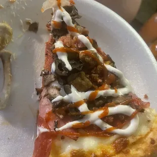 My daughters pizza with Sriracha and ranch
