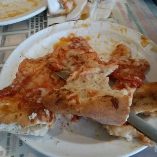 By far the greasiest, blandest pizza I have ever eaten. 20 dollars for this?! Never again.