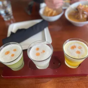 The pisco sour sampler. From left to right : serrano, classic, passion fruit.