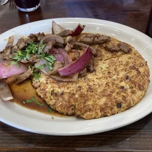 Tacu Tacu with Lomo Saltado- I like a lot of juice so I asked for extra when ordering.