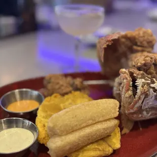 Pescado Frito - deep fried snapper, yuca, tostones, garlic and cilantro aioli