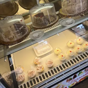 a display of cakes and pastries
