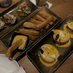 Papas a la Huancaina, Yuca, Crab Tostones