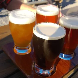 Chillin' outside on their patio as the sun goes down by the mountains. Couldn't ask for anything more.
