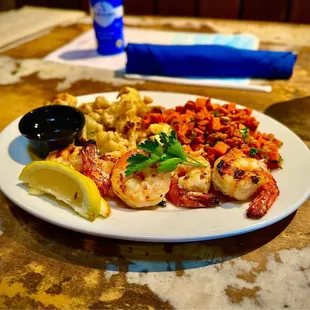 Grilled Jumbo Prawns were good, not great. Sweet potato hash &amp; cauliflower w/almonds were good but greasy.