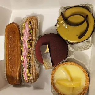 a variety of pastries in a box