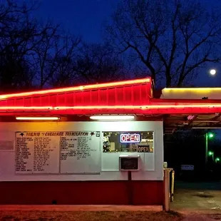 a neon sign for a restaurant