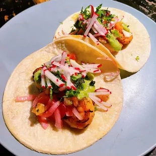 Shrimp Al Pastor Tacos: pineapple pico, pickled red onions, salsa verde, cilantro