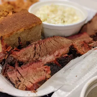 1/2 lb Beef Brisket. Part of the 2 Meat Combo and 2 Sides and Bread ($20.60).