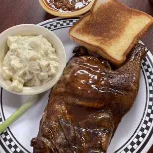 1/2 chicken meal with beans and potato salad $13