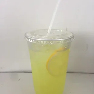 a drink in a plastic cup