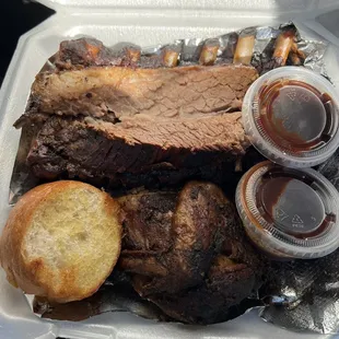 Combination Platter for 3 rib, chicken and brisket comes with two sides