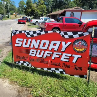 a sign for sunday buffet