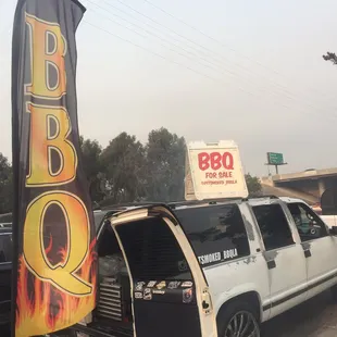 a truck with a bbq sign