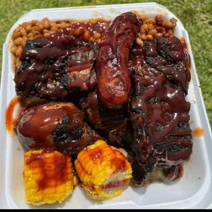 Hot link, rib tips, chicken, bbq baked beans, smoked corn