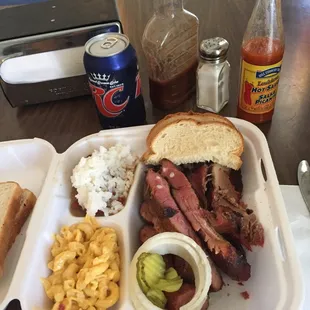 Brisket, sausage, and ribs with Mac and cheese and red beans and rice.