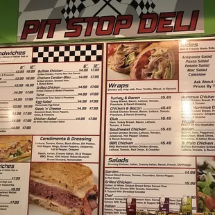a menu for the pit stop deli