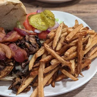 Mushroom-Swiss burger The menu did not mention bacon I saved the bacon for my dogs