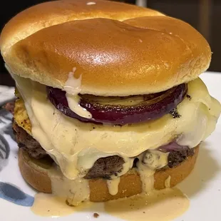 'Ono- 1/2 pound steak burger topped with grilled pineapple and red onion, cheese and our teriyaki aioli.