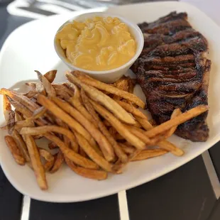 Ribeye with fries and Mac n cheese