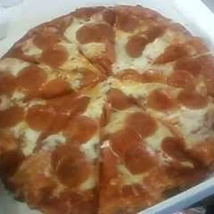 a pepperoni pizza in a box