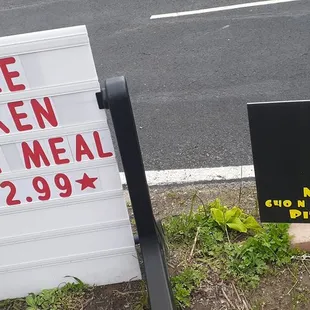 a sign for a whole chicken family meal