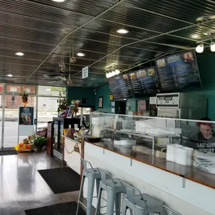 View of counter space with menu visible above the staff.