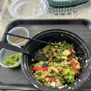 Chicken Shawarma Salad Bowl with garlic jalpeno zest and dressing.