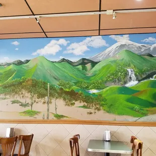 a mural of a mountain landscape