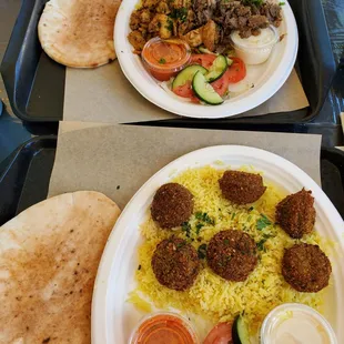 Mixed meat (chicken and beef) and falafel plate. It comes with rice, tomatoes, Cucumbers, onions and pita with garlic and hot sauce