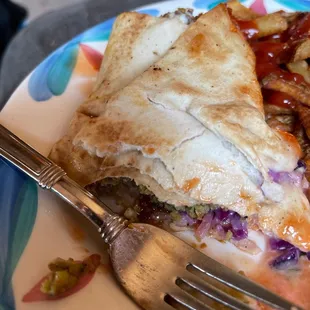 a plate of food with a fork