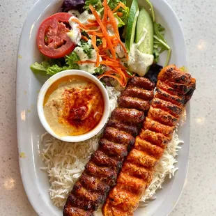 a plate of grilled meat and vegetables