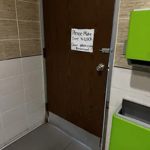 Female restroom door