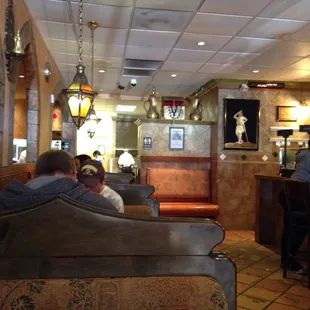 people sitting at the bar