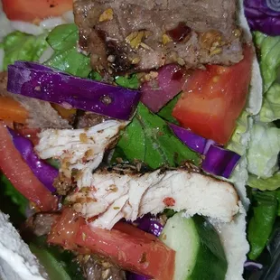 My carry-out lamb &amp; chicken kebob dinner w/ rice &amp; salad, fresh pita bread &amp; garlic spread. Very fresh &amp; tasty. Meat overcooked for my taste