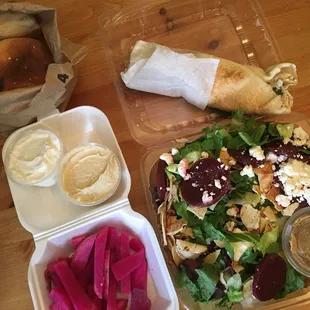 Fresh Bread, Falafel with Tabbouli and Hommous Sandwich, Greek Fattoush, turnips, side of Hommous, and Garlic Spread side.