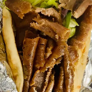 a pita sandwich wrapped in foil