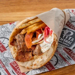 Lamb &amp; Beef Gyro wrapped in a hand made pita imported from Greece