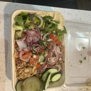 Chicken shawarma bowl with many toppings