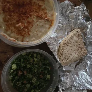 9-9-2024 Two tubs of babagnoush,  a tub of tabouleeh and pita bread