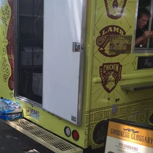 a food truck parked on the side of the road