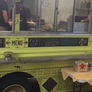 a yellow food truck